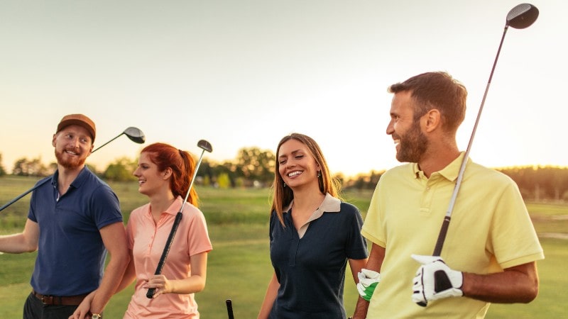 Group of people golfing