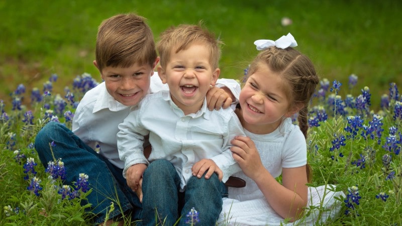 Smiling kids in family portrait